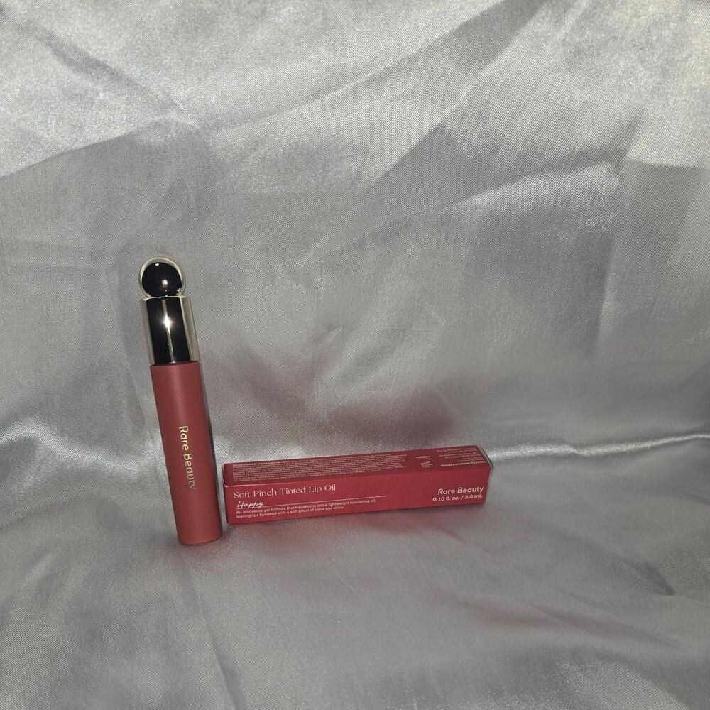 Rare Beauty Soft Peach tinted lip oil in shade "Happy"